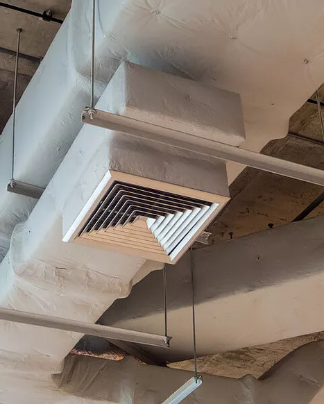 An air vent with ductwork at a Las Vegas commercial property.