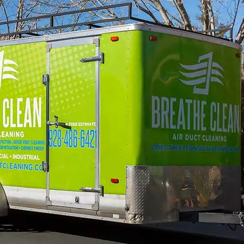 A trailer with air duct tools and equipment for duct cleaning and repairs.